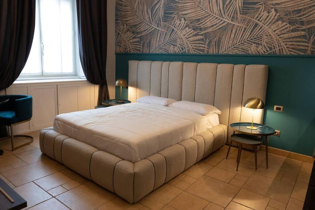 a bedroom with a large bed in a room at Spazio SIMA Space 2 - 1 in Milan