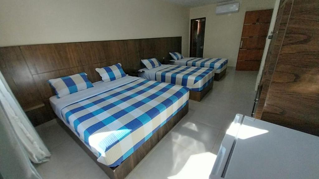 Postel nebo postele na pokoji v ubytování Hotel Villa