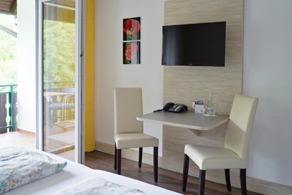 Voodi või voodid majutusasutuse Hotel Faxe Schwarzwälder Hof toas