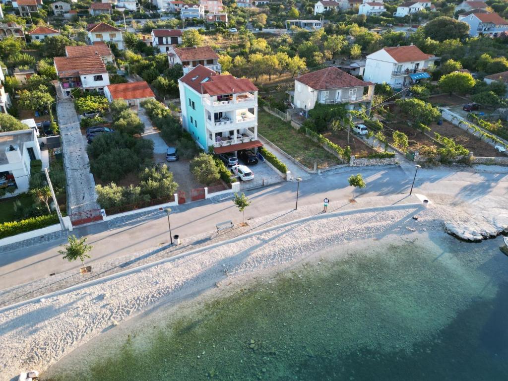 an aerial view of a beach and houses at Villa Luce in Vinišće