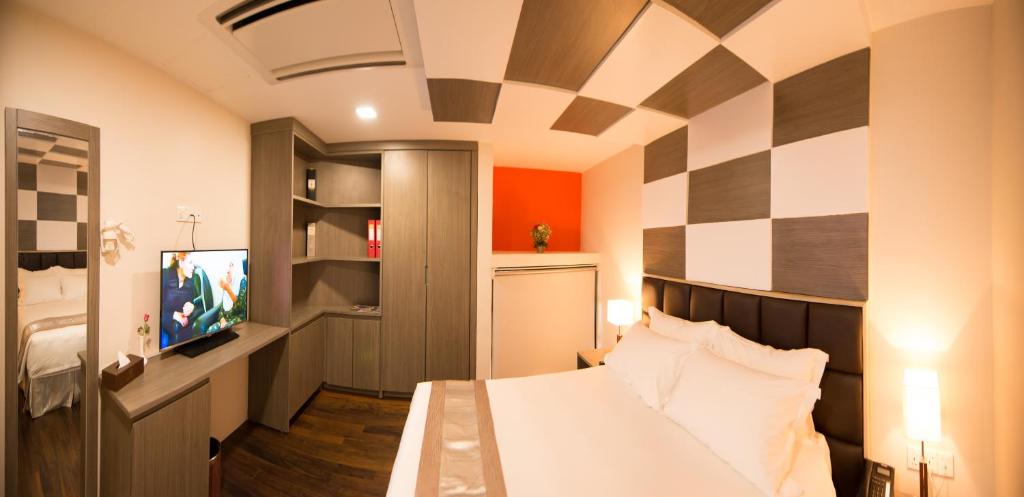 TV a/nebo společenská místnost v ubytování Hotel Parami