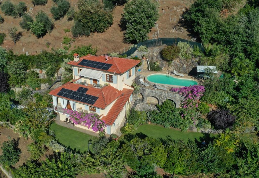 an aerial view of a house with solar panels on its roof at Villa Romantica Sea View in Camaiore