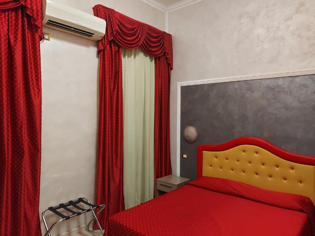 A bed or beds in a room at Appartamenti Valdocco