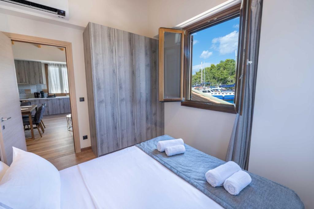 Postel nebo postele na pokoji v ubytování Casa Mare e Olio by All About Paxos