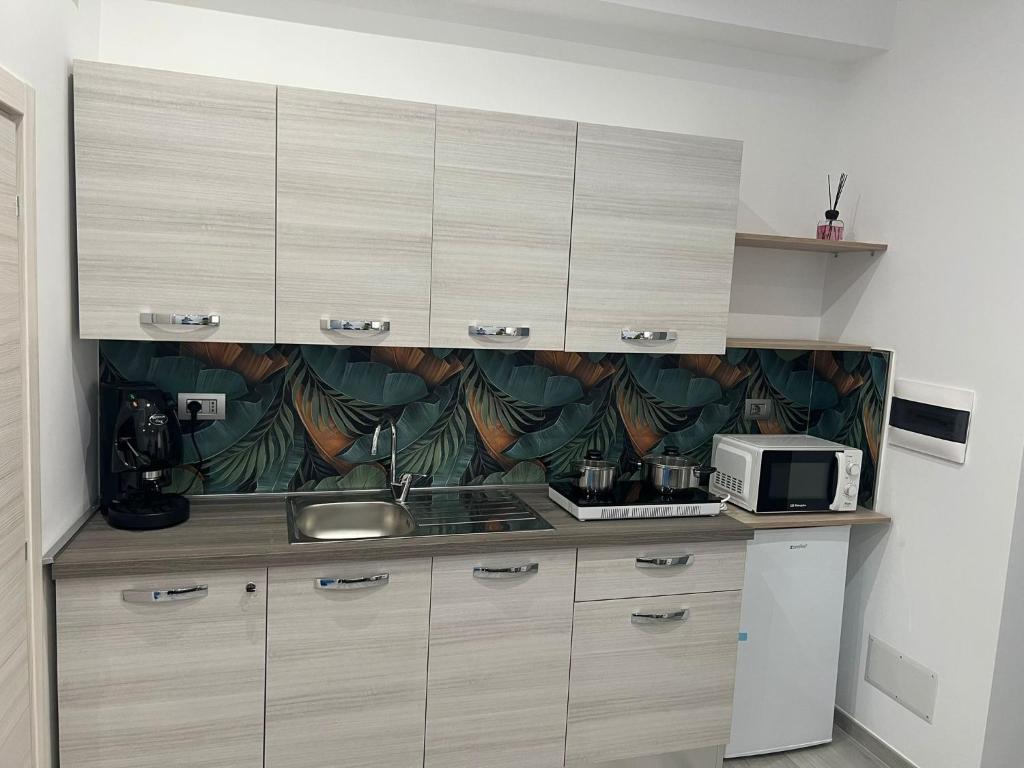 Η κουζίνα ή μικρή κουζίνα στο punto house leopardi