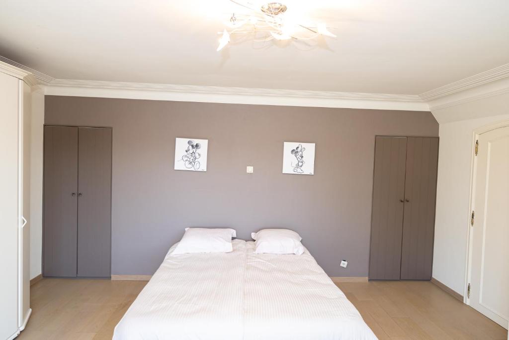 Postel nebo postele na pokoji v ubytování De Boter Villa