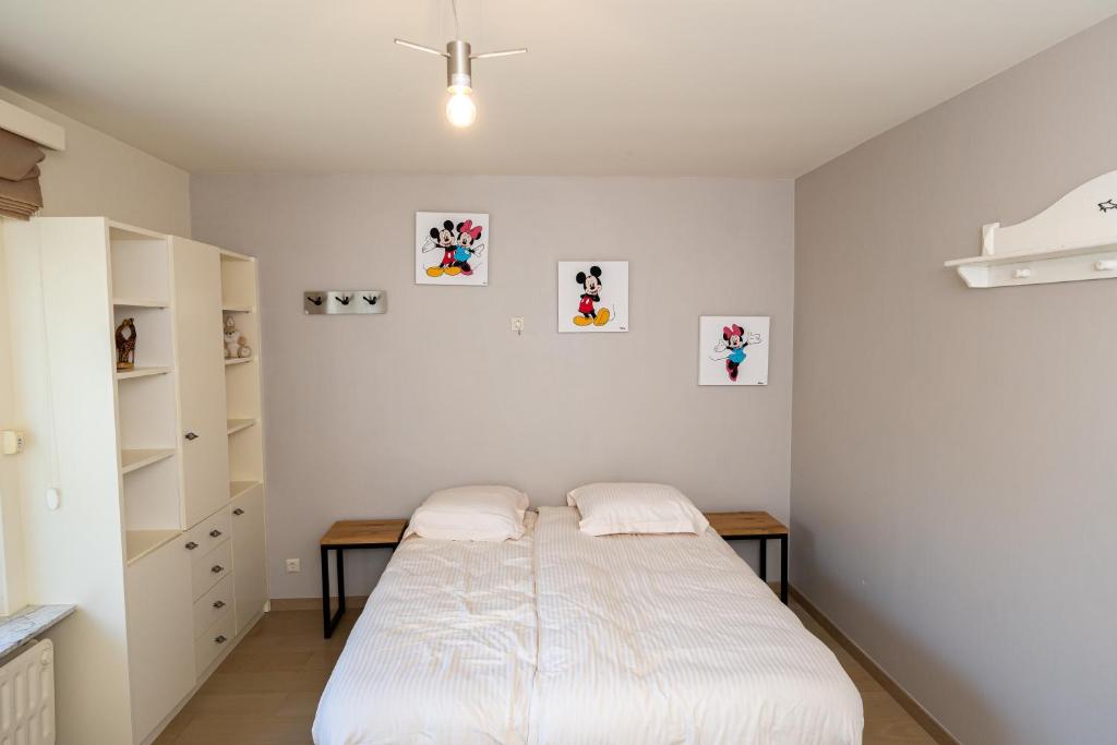 Postel nebo postele na pokoji v ubytování De Boter Villa