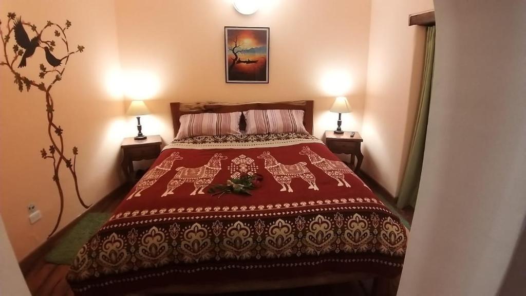 Postel nebo postele na pokoji v ubytování ITCHIMBIA GARDEN con la mejor vista de Quito y SPA