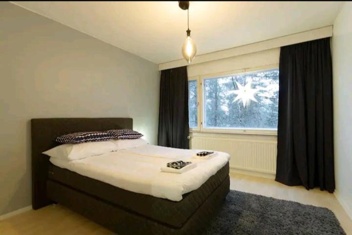 Postel nebo postele na pokoji v ubytování A beautiful Lapland home in Rovaniemi for 1-7