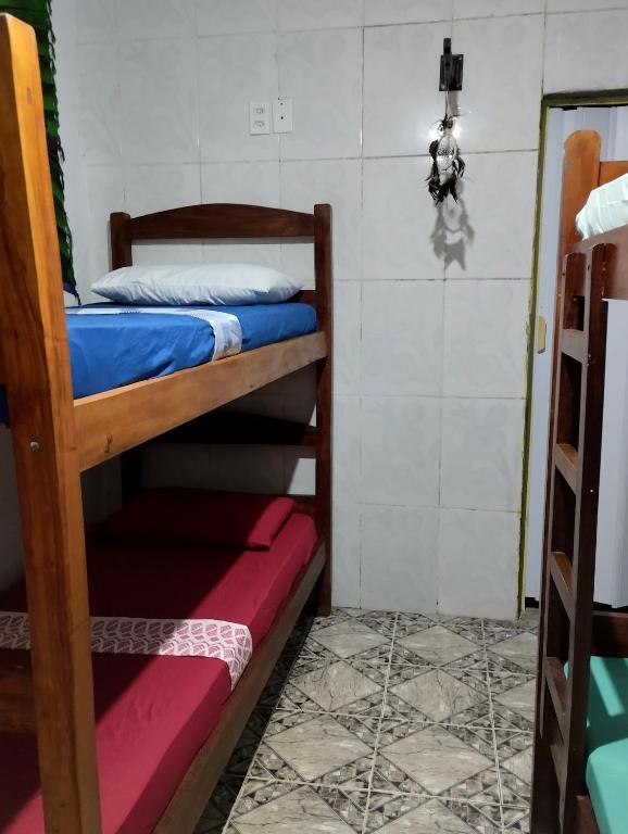 Postel nebo postele na pokoji v ubytování Jurema Hostel