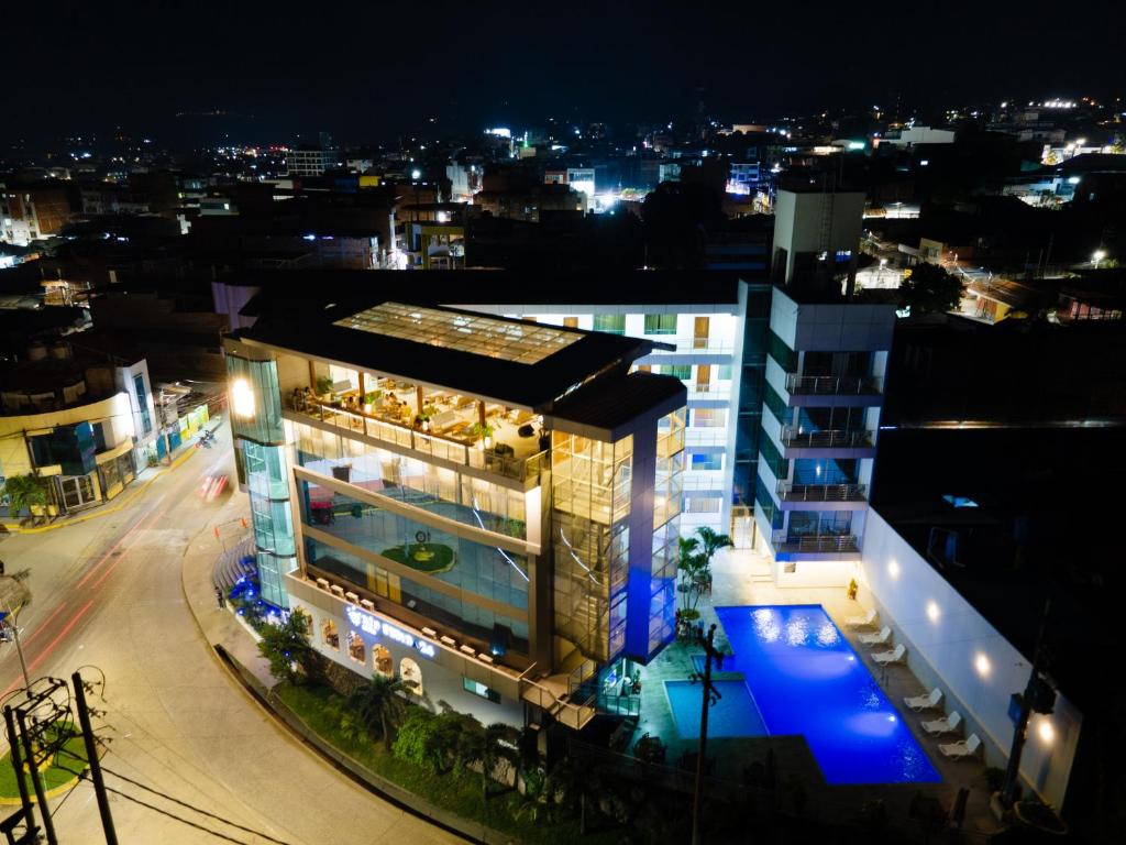 a view of a building at night at Rio Cumbaza Hotel in Tarapoto