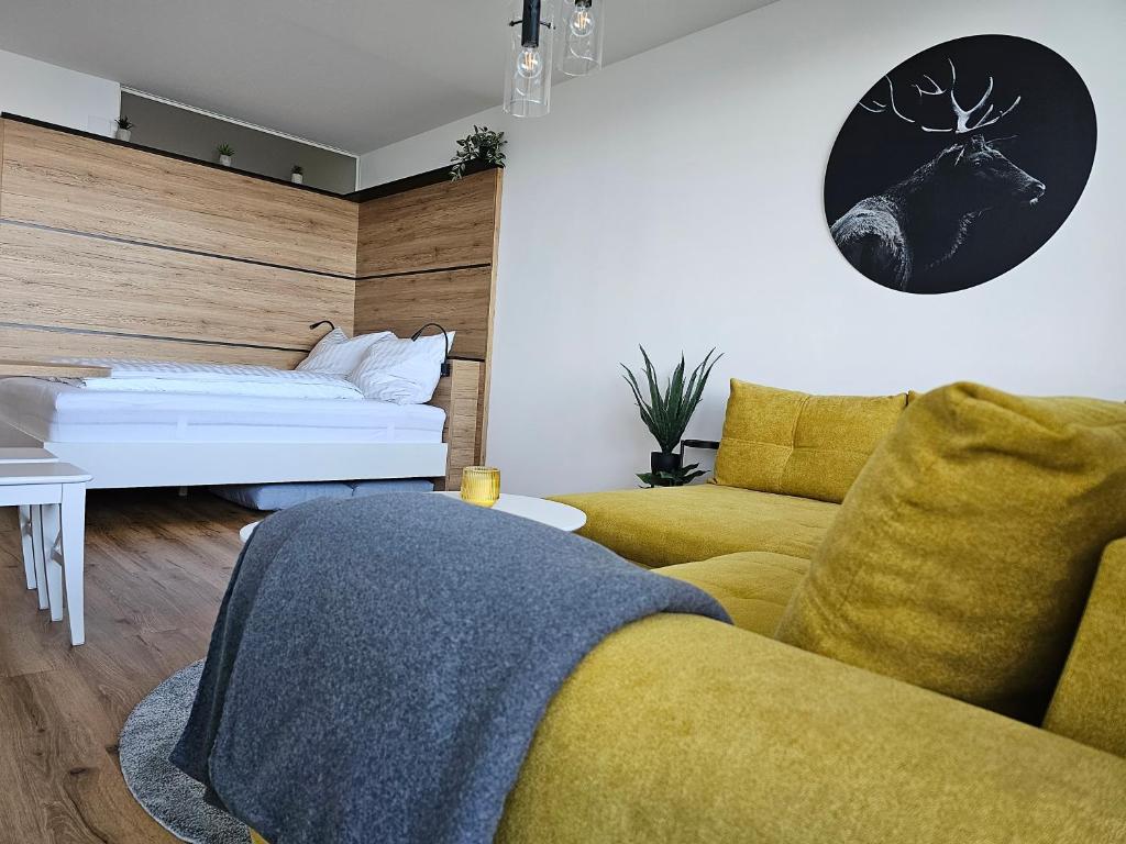 Postel nebo postele na pokoji v ubytování Gerlitzen-Apartments