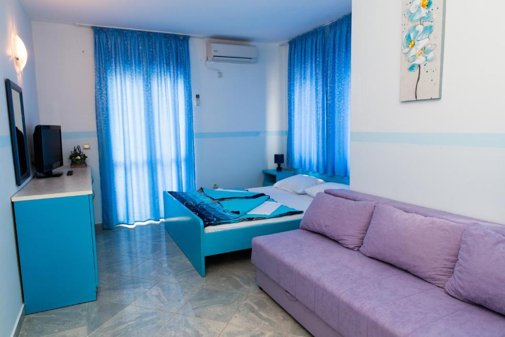 TV a/nebo společenská místnost v ubytování Hotel Obala