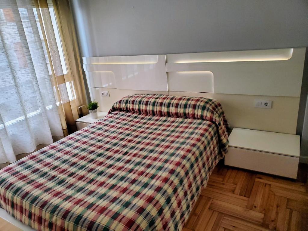A bed or beds in a room at Casa Porto, con Garaje