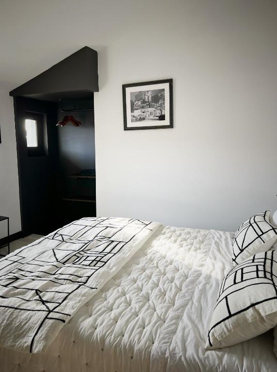 Postel nebo postele na pokoji v ubytování Maison d'hôte Les Allois