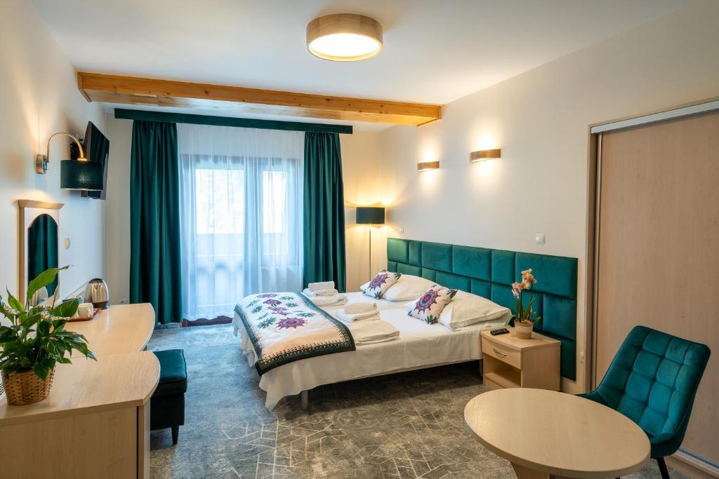 Posteľ alebo postele v izbe v ubytovaní Willa Monte Rosa