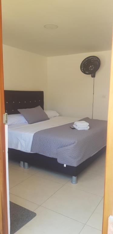 Postel nebo postele na pokoji v ubytování Hotel Resort Campestre Puerta Del Sol - San Gil