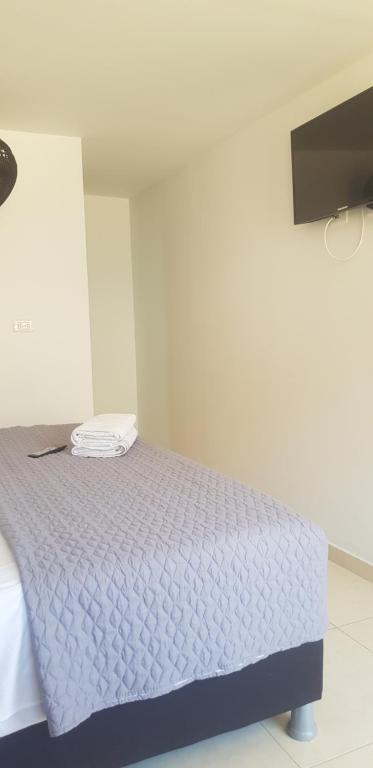 Postel nebo postele na pokoji v ubytování Hotel Resort Campestre Puerta Del Sol - San Gil