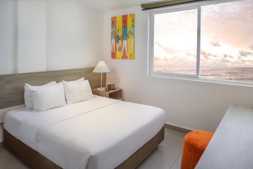 Postel nebo postele na pokoji v ubytování Hotel Decameron Maryland All Inclusive