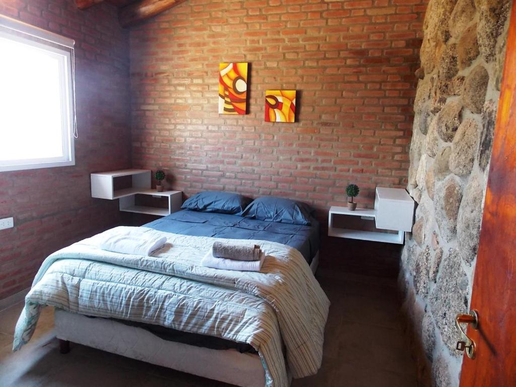 Krevet ili kreveti u jedinici u okviru objekta Cabañas El Moradillo