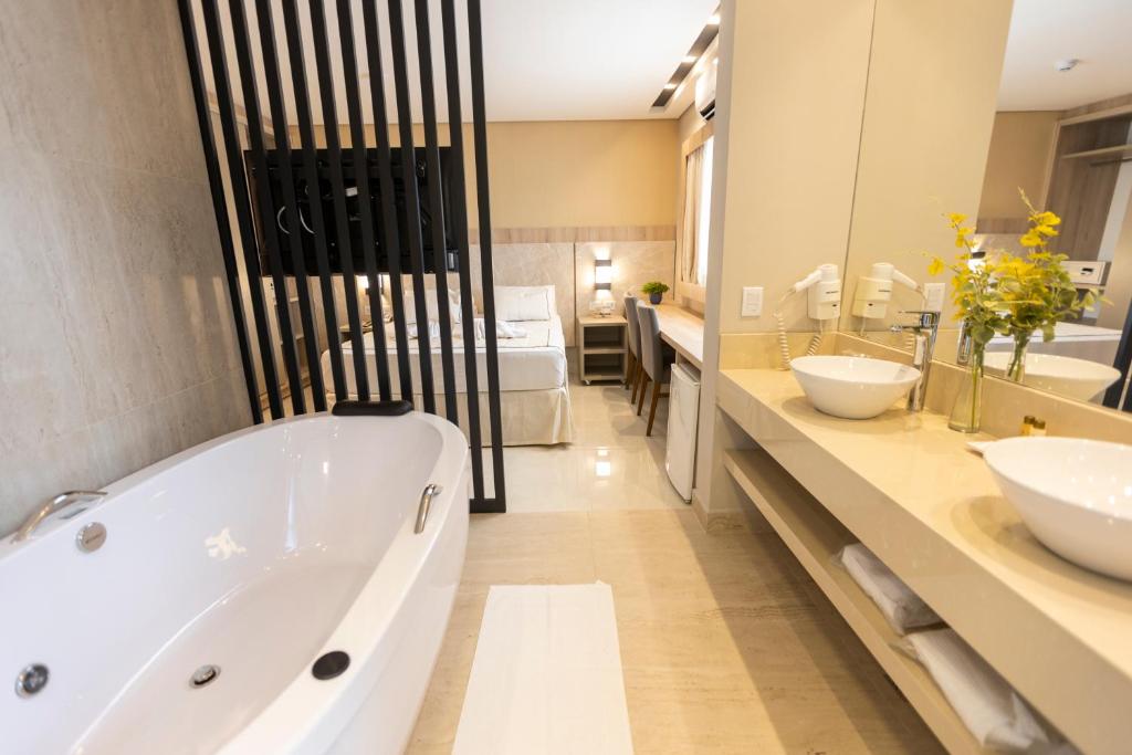 Koupelna v ubytování Nadai Confort Hotel e Spa