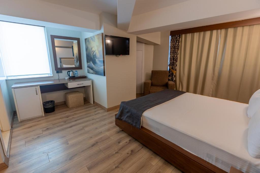 TV a/nebo společenská místnost v ubytování Asia Business Suites