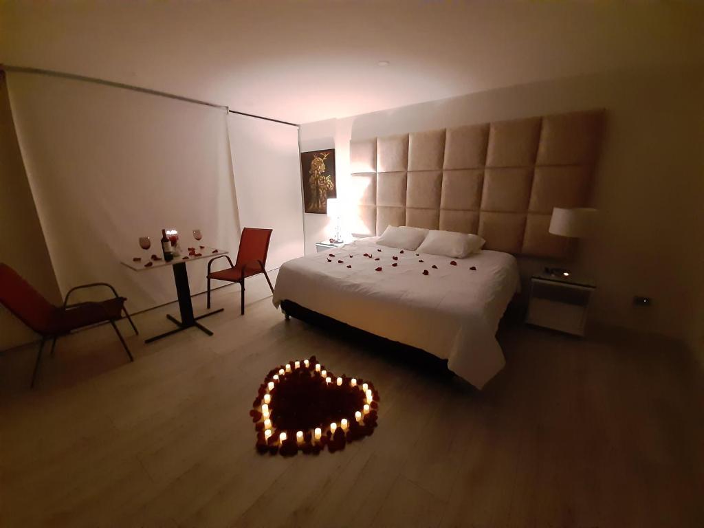 Postel nebo postele na pokoji v ubytování Mirador samsara Suite Luxury piso completo