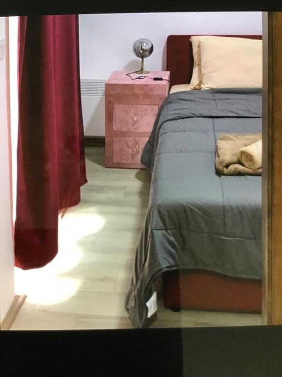 Postel nebo postele na pokoji v ubytování De Lux Nedeljkovic
