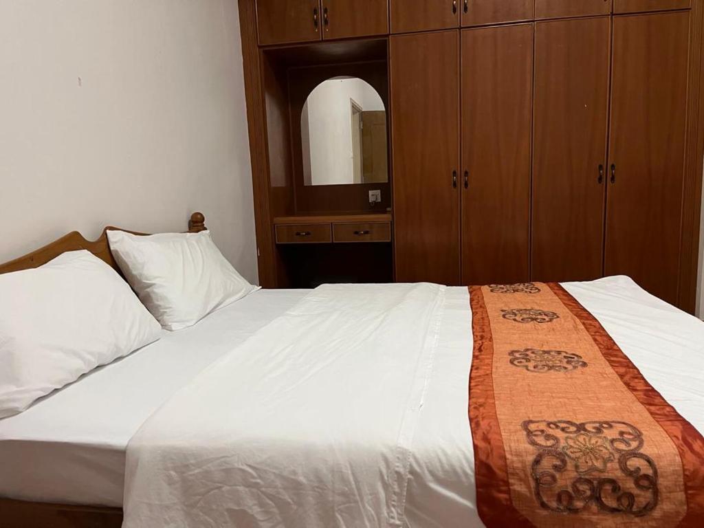 Miri City Centre Condo @ Imperial Mallにあるベッド