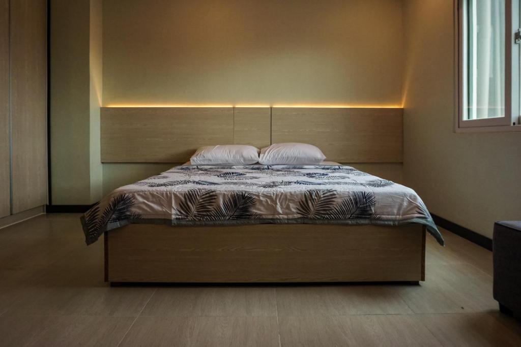Postel nebo postele na pokoji v ubytování Emmaus condotel