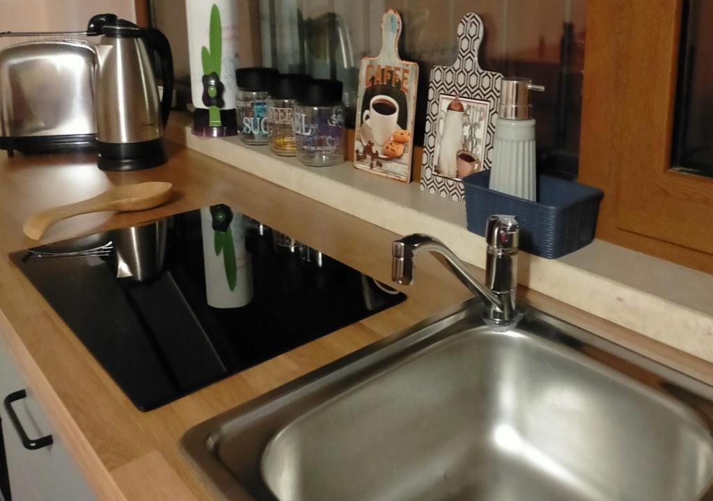 Kuchyň nebo kuchyňský kout v ubytování Sunnyhill Home
