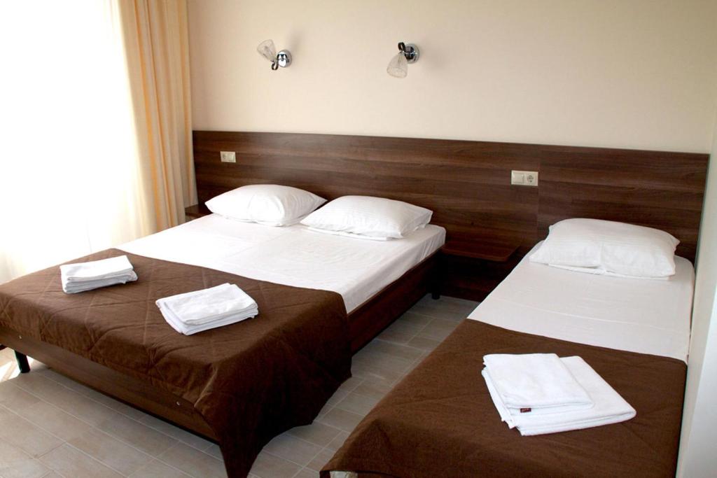 Cama o camas de una habitación en Hotel Morskaya Volna