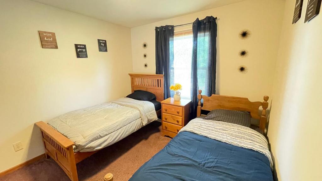 Postel nebo postele na pokoji v ubytování Luxx Guest House