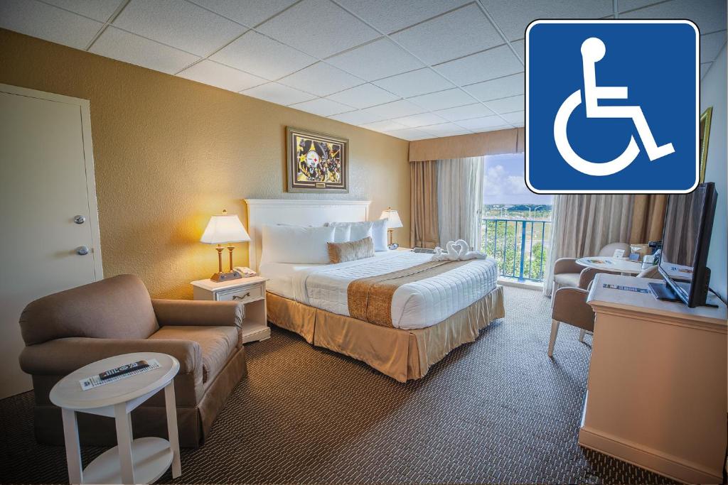 Postel nebo postele na pokoji v ubytování Stadium Hotel