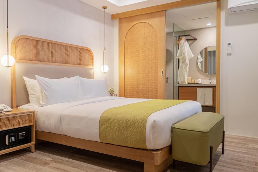 Postel nebo postele na pokoji v ubytování Mandarin Nest Boracay