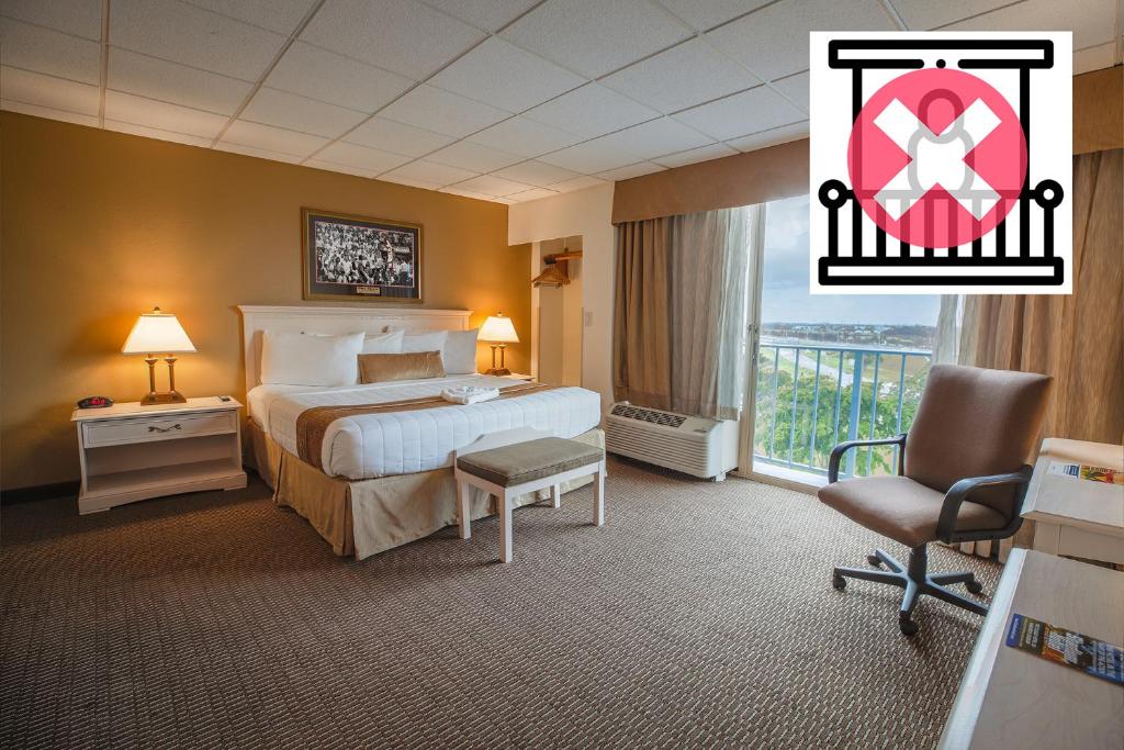 Postel nebo postele na pokoji v ubytování Stadium Hotel