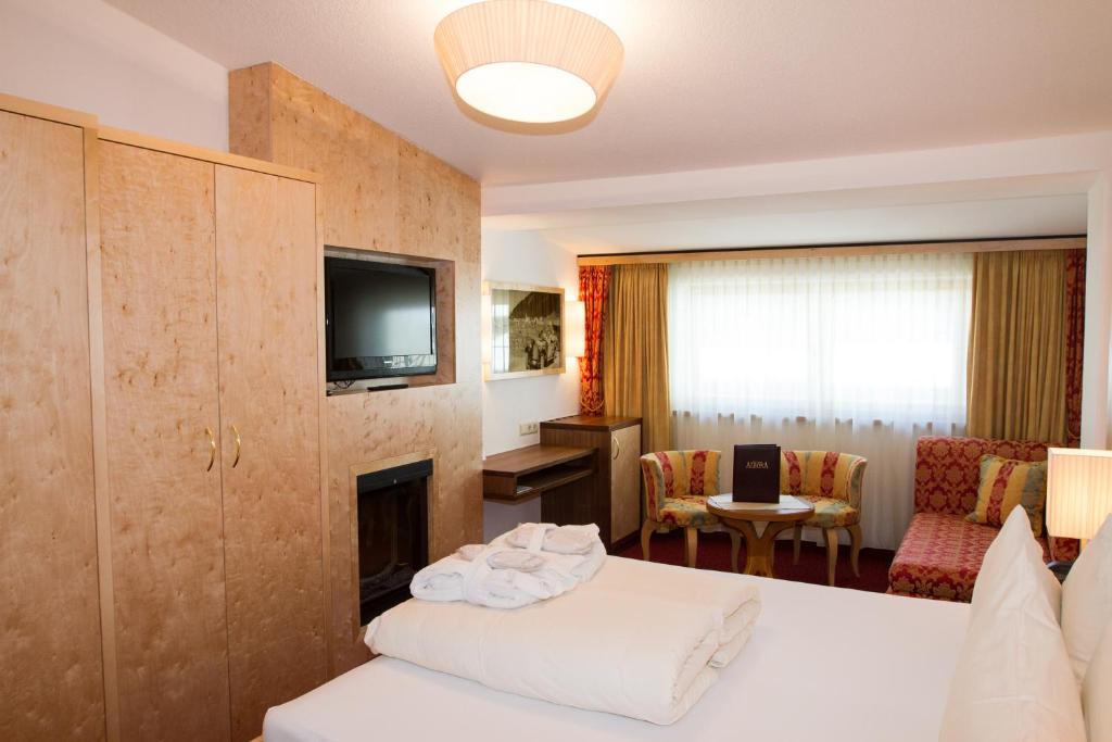 Postel nebo postele na pokoji v ubytování Hotel Albona