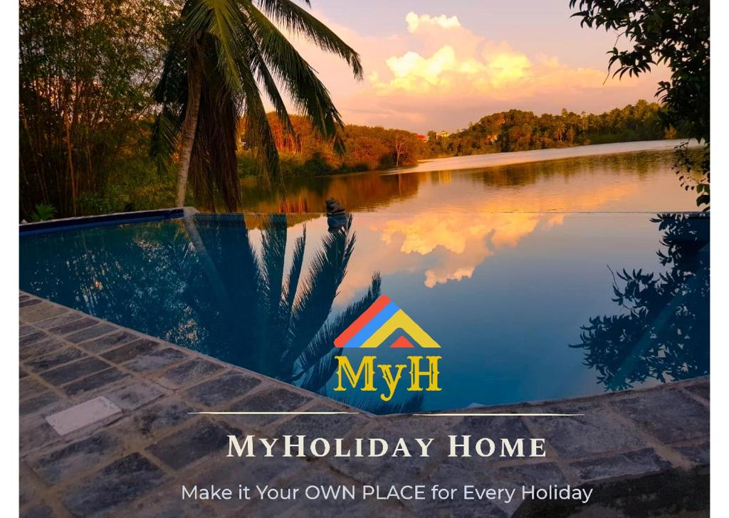a picture of a lake with the myiji holiday home logo at Myh Lake Front Pvt Villa with Staff, Near City, Inc Free Breakfast in Bandaragama