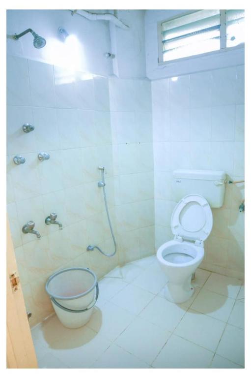 Koupelna v ubytování Hotel Jeyasakthi