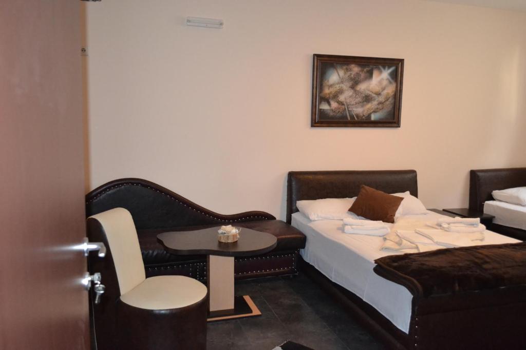 Postel nebo postele na pokoji v ubytování Guesthouse Vila DND