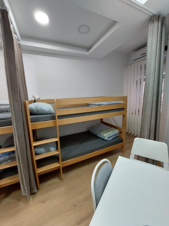 Postel nebo postele na pokoji v ubytování Hostel Inn Downtown