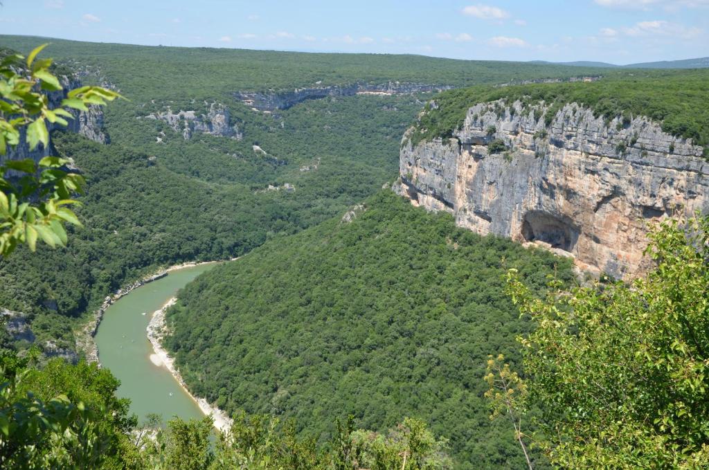 a view of theirgin river from the blue mountains at Apartments La Vieille Source in Saint-Martin-dʼArdèche