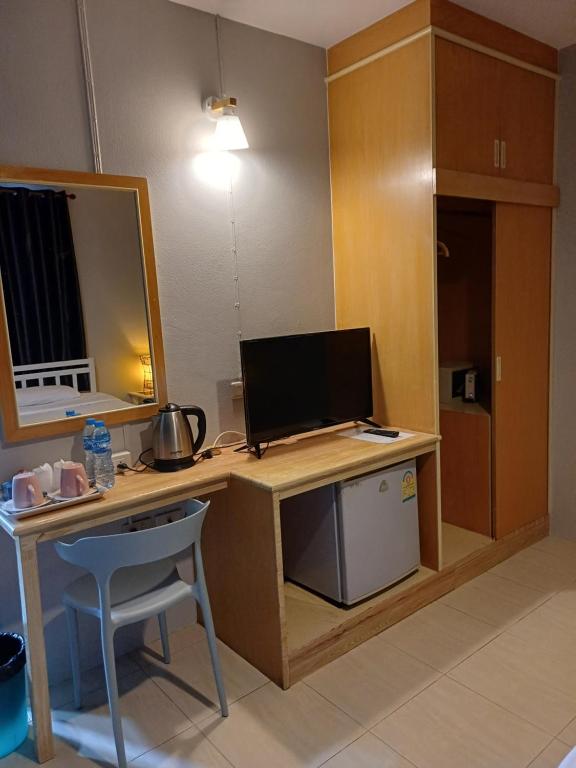 TV a/nebo společenská místnost v ubytování AT home hotel