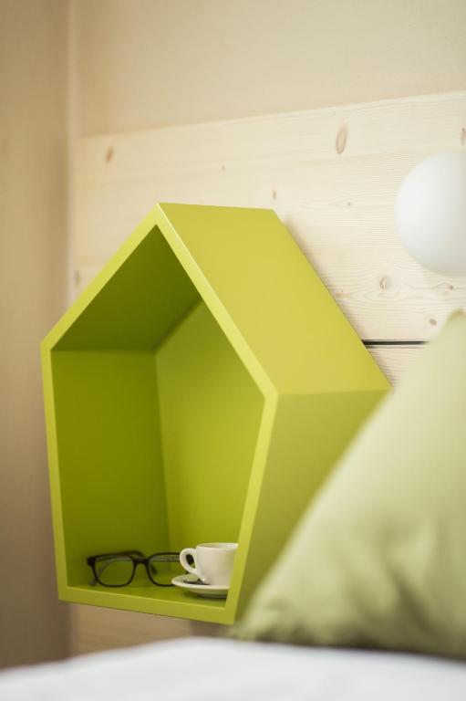 Postel nebo postele na pokoji v ubytování Quader nidi nel verde