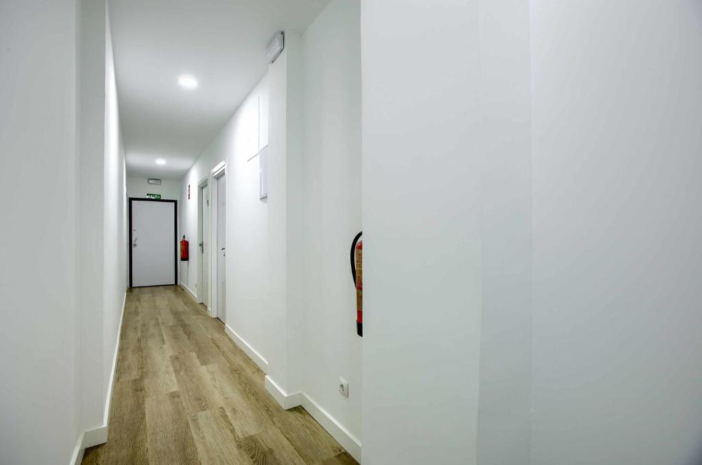 Kép Casa de Huéspedes 12 Octubre Rooms szállásáról Madridban a galériában
