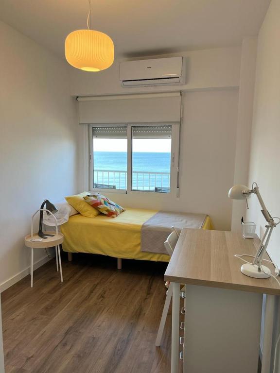 Postel nebo postele na pokoji v ubytování SAN MIGUEL PLAYA ALMERIA