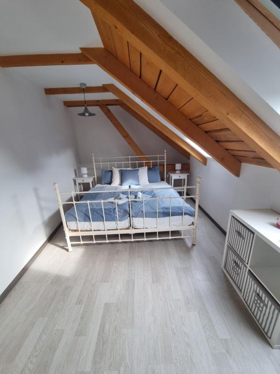 Postel nebo postele na pokoji v ubytování Čenovický dvůr