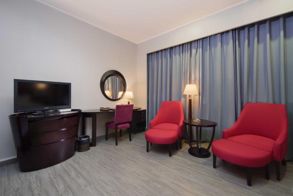 TV a/nebo společenská místnost v ubytování Foshan Guanxin Hotel