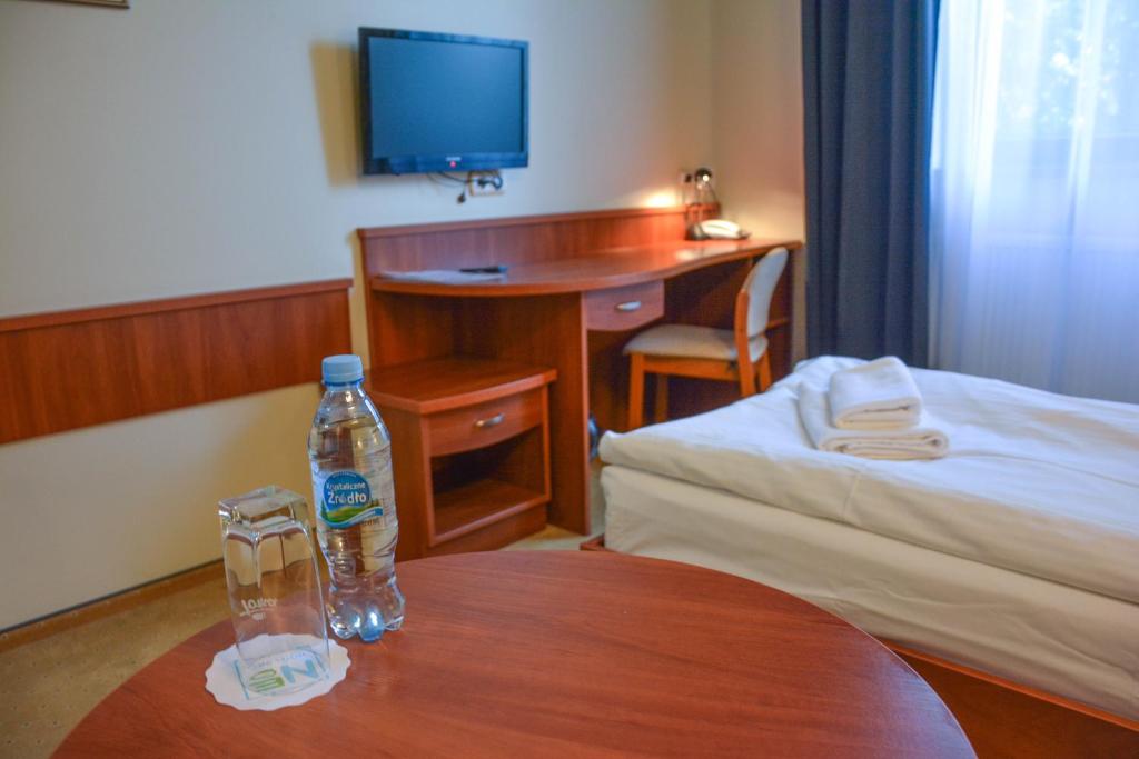 Postel nebo postele na pokoji v ubytování Hotel Neo