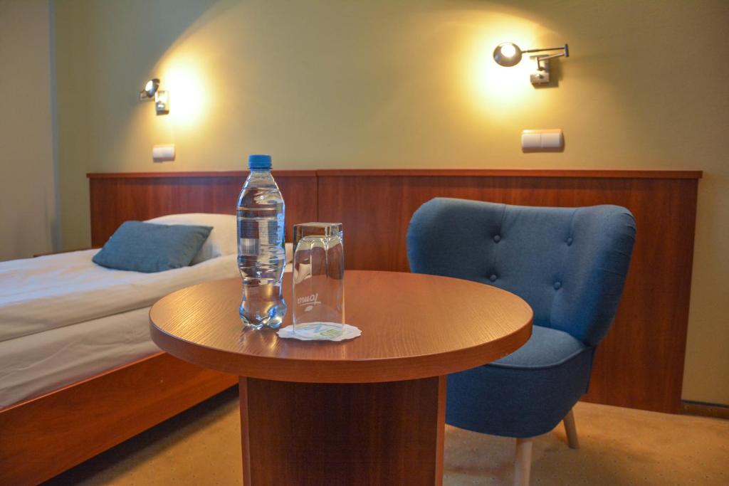 Postel nebo postele na pokoji v ubytování Hotel Neo